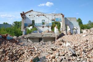 Collapsed industrial multistorey building in daytime photo