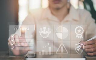 man check mark about exploring topics,In the virtual form check sheet,checklist ideas, checkbox to conduct opinion and quality surveys or satisfaction,Connect and work with modern wireless technology photo