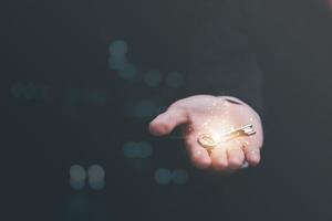 solution concept and demonstrating leadership strategies,that lead the business in a successful direction,with innovation and brain power from brainstorming,key to success in the hands of businessman photo