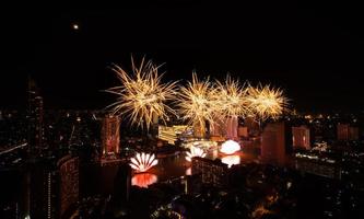 Spectacular fireworks display along the Chao Phraya River Bangkok, Thailand photo