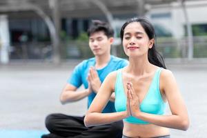 healthy man and woman yoga exercise for relax health yoga class sport exercise together with happy moment and balance fit bidy on yoga mat fitness photo