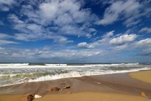Rain clouds in the sky over the Mediterranean Sea in northern Israel. photo