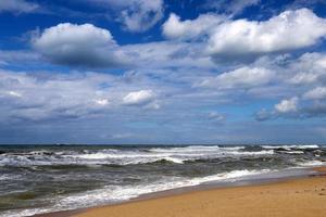 Rain clouds in the sky over the Mediterranean Sea in northern Israel. photo