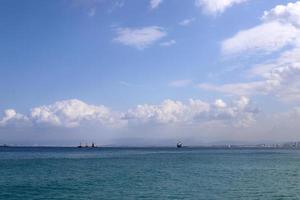 Rain clouds in the sky over the Mediterranean Sea in northern Israel. photo