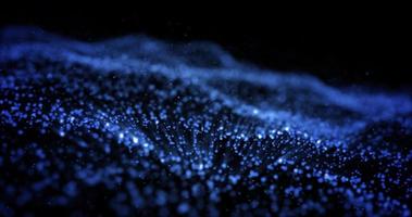 Abstract blue glowing energy waves from particles and magical dots with blur effect on dark background. Abstract background photo