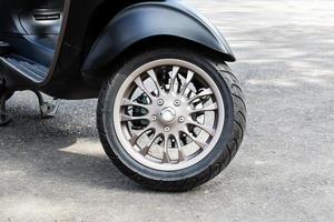 Silver color front wheel motorcycle scooter photo