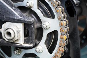 Motorcycle sprocket with texture rusty chain photo