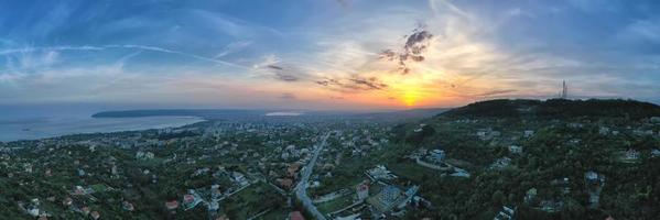 Amazing aerial panoramic view of coast and Varna city, Bulgaria at sunset photo