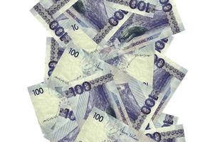 100 Philippine piso bills flying down isolated on white. Many banknotes falling with white copyspace on left and right side photo