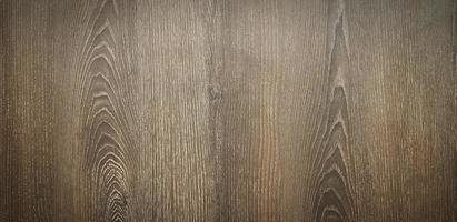 Brown wooden background. Wood panel wall or wallpaper. photo