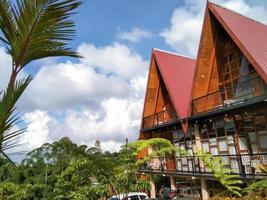 Probolinggo,Indonesia. Nov.2022 a villa or cottage with a triangular shape and a background of blue sky and clouds in the bromo area of Indonesia photo