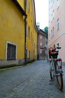 Travel to Salzburg, Austria. A bicycle on the narrow street in the city center. photo