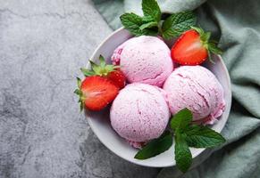 Homemade strawberry  ice cream with fresh strawberries photo