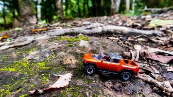 Minahasa, Indonesia December 2022, the toy car in nature photo