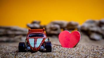 Minahasa, Indonesia December 2022, the toy car with a heart in front of it photo