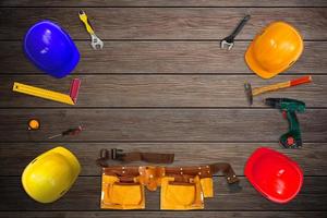 construction tools. House Renovation on wooden background photo