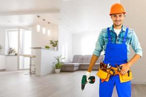 Worker with a tool belt photo