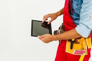 Construction Worker with a tablet. Planning Developer Concept photo