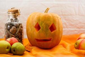 pumpkin head on a brick wall background photo