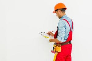 Attractive worker with clip board photo