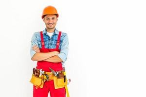 Stock image of male construction worker over white background photo