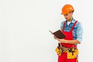 worker with notebook over white background photo