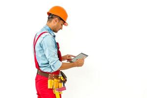 Cheerful Technician Holding tablet Over White Background photo