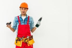 Construction worker with helmet and screwdriver photo