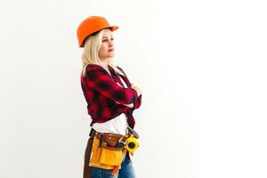girl with construction tools hat photo