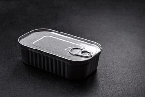 Tin or aluminum rectangular can of canned food with a key photo