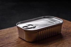 Tin or aluminum rectangular can of canned food with a key photo