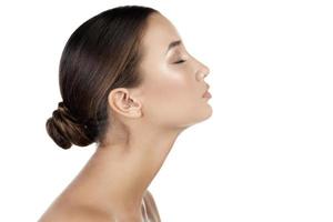 Pretty woman with long neck, isolated on white background photo