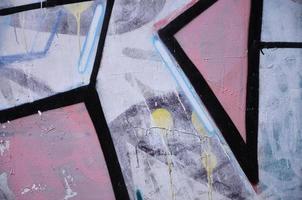 The old wall, painted in color graffiti drawing with aerosol paints. Background image on the theme of drawing graffiti and street art photo