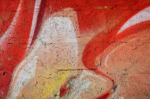 Abstract graffiti paintings on the concrete wall. Background texture photo