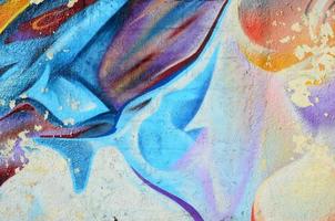 Abstract graffiti paintings on the concrete wall. Background texture photo