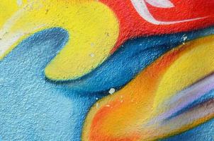Abstract graffiti paintings on the concrete wall. Background texture photo