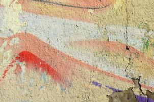 pinturas abstractas de graffiti en la pared de hormigón. textura de fondo foto