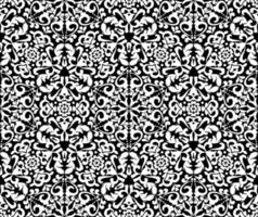 Ornate white pattern on a black background. Demaski seamless elegant pattern. Lace pattern. Black and white color. Vector graphic vintage pattern. For fabric, tile, wallpaper or packaging.