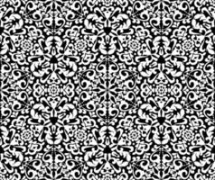 Ornate white pattern on a black background. Demaski seamless elegant pattern. Lace pattern. Black and white color. Vector graphic vintage pattern. For fabric, tile, wallpaper or packaging.