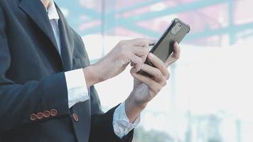 Businessman using tablet analyzing sales data and economic growth graph chart. Business strategy. Abstract icon. Digital marketing. video