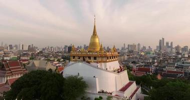 An aerial view of the Golden Mount stands prominently at Saket Temple, The most famous tourist attraction in Bangkok, Thailand video