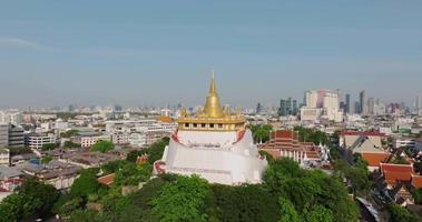 An aerial view of the Golden Mount stands prominently at Saket Temple, The most famous tourist attraction in Bangkok, Thailand video