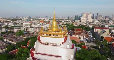 An aerial view of the Golden Mount stands prominently at Saket Temple, The most famous tourist attraction in Bangkok, Thailand video