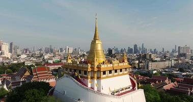 An aerial view of the Golden Mount stands prominently at Saket Temple, The most famous tourist attraction in Bangkok, Thailand video