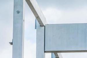 Precast concrete elements during installation on construction site photo