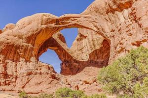 Panoramic picture of natural and geological wonders of Arches national park in Utah in winter photo