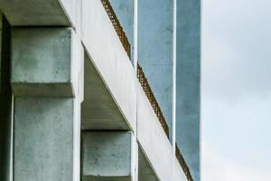 Precast concrete elements during installation on construction site photo