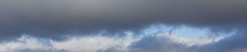 Image of a partly cloudy and partly clear sky during the day photo