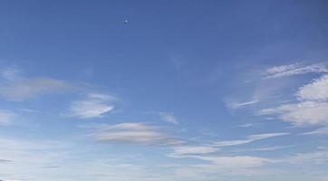 Image of a partly cloudy and partly clear sky during the day photo