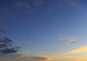 Dramatic colorful sky with afterglow and illuminated clouds photo